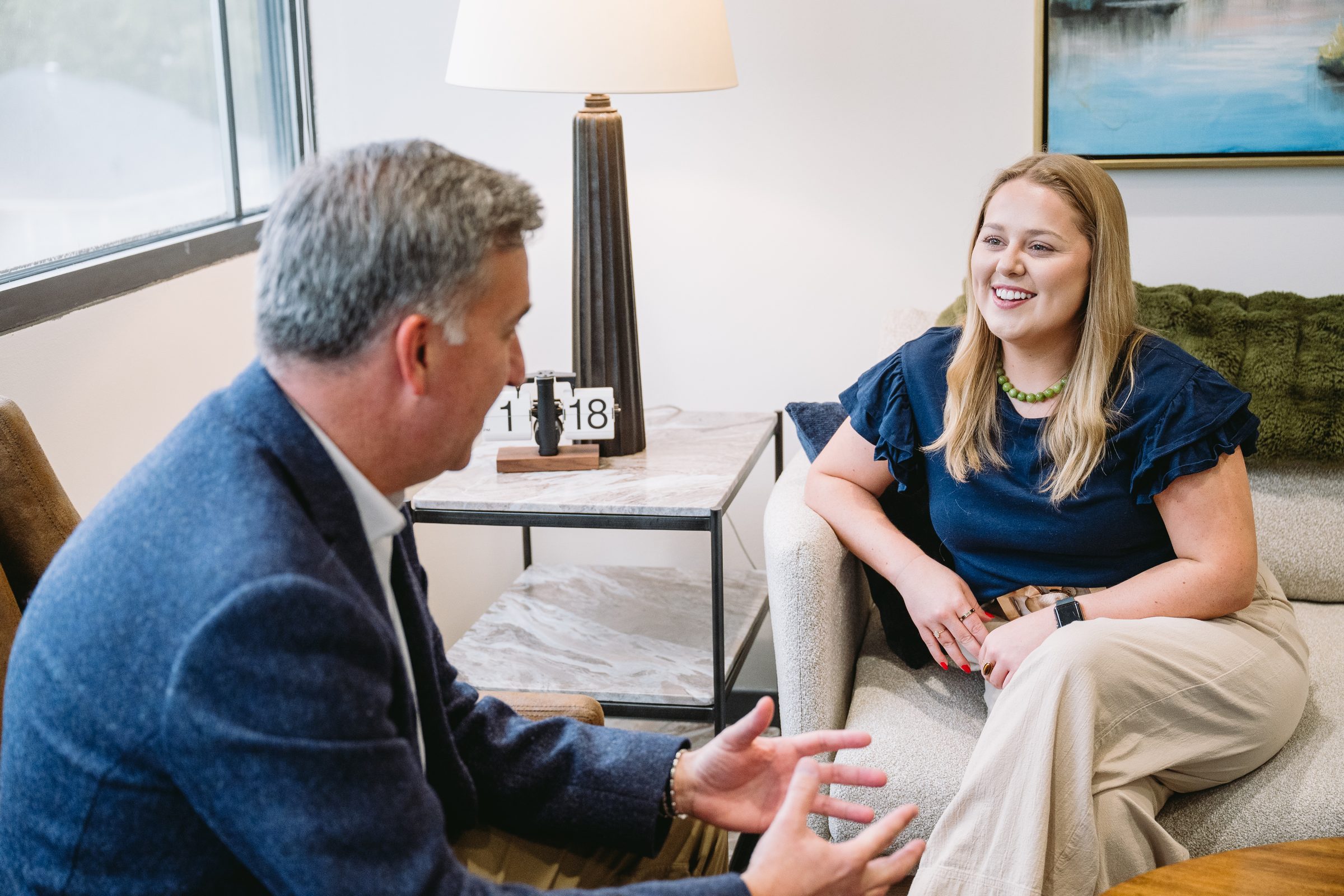 David Felder meeting with Lindy Watford in the Cypress Bay Wealth office